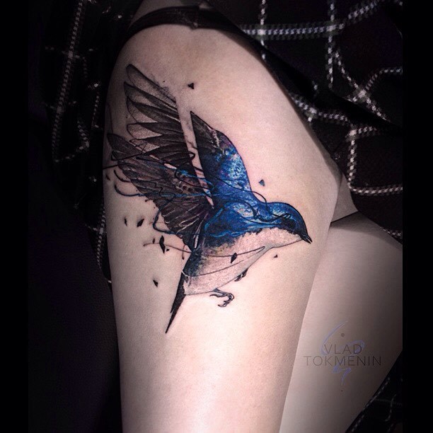 Tree swallow tattoo on the right thigh by Vlad Tokmenin