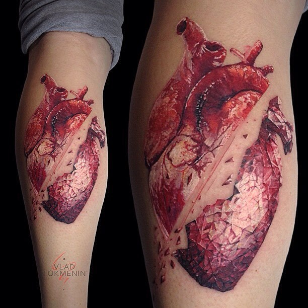 Graphic style anatomical heart tattoo on the calf by Vlad Tokmenin