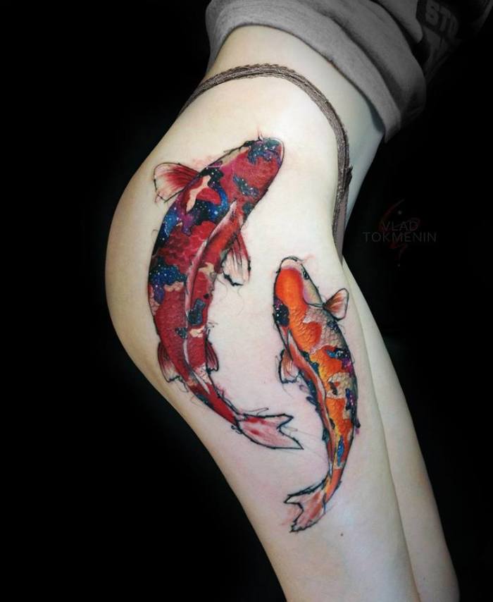 Koi fish graphic tattoos on the right hip and thigh by Vlad Tokmenin