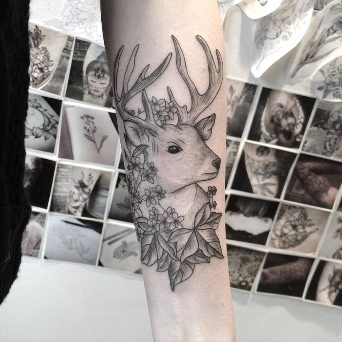 Deer tattoo with forget-me-nots and ivy leafs by Mary Tereshchenko 
