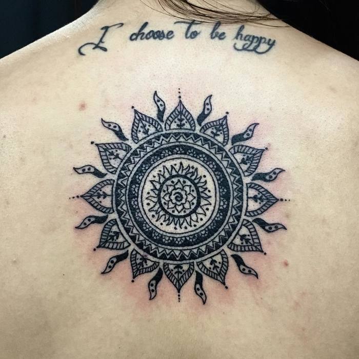Upper back mandala tattoo by Charlotte Dolce