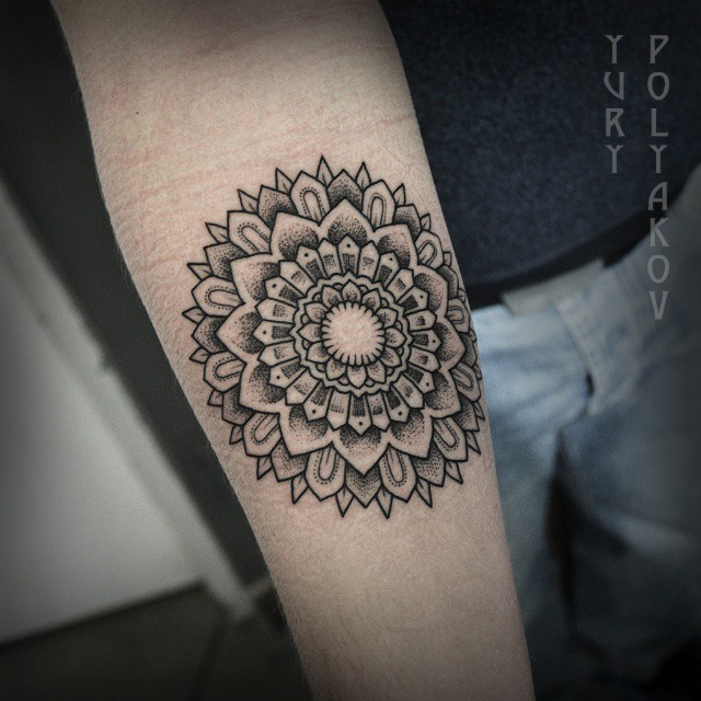 Inner forearm mandala tattoo by Yury Polyakov