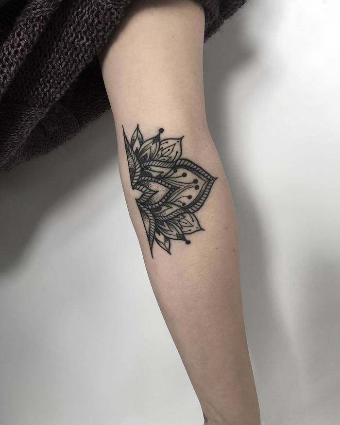 Half mandala tattoo by Caterina Ferraro
