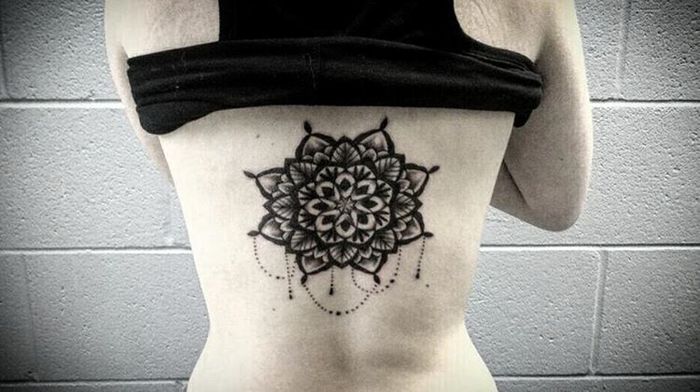 Mandala tattoo on back by Liam Chung