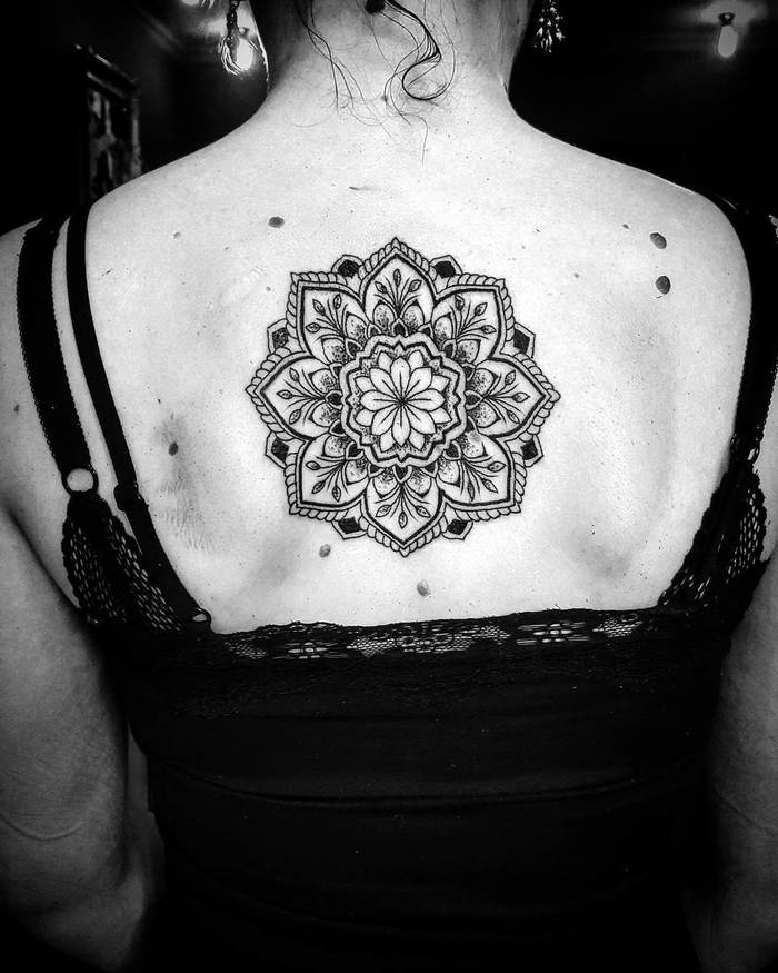 Upper back mandala tattoo by Charlotte Van Halderen