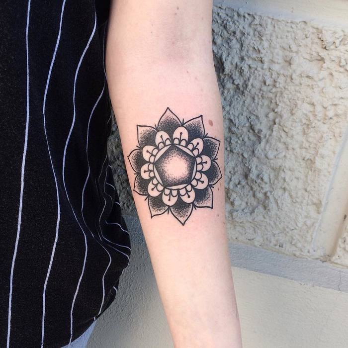 Inner forearm mandala tattoo by Nicola Enne Pi
