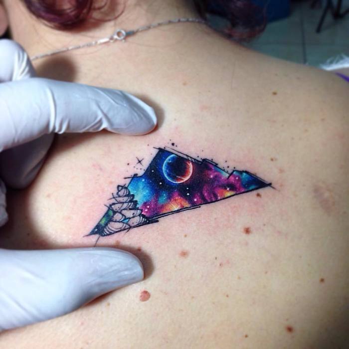 Space-Inspired Watercolor Tattoo By Adrian Bascur