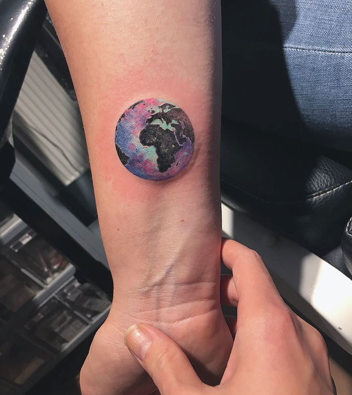 Colorful Tiny Earth Tattoo By Eva Krbdk