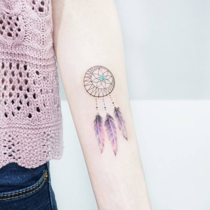 Delicate dreamcatcher tattoo by Tattooist Ida