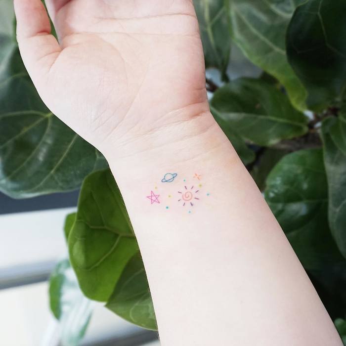 Miniature tattoos by Tattooist Ida