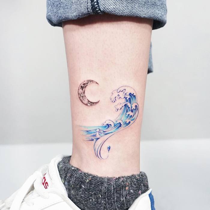 Wave and crescent Moon tattoos by Tattooist Ida