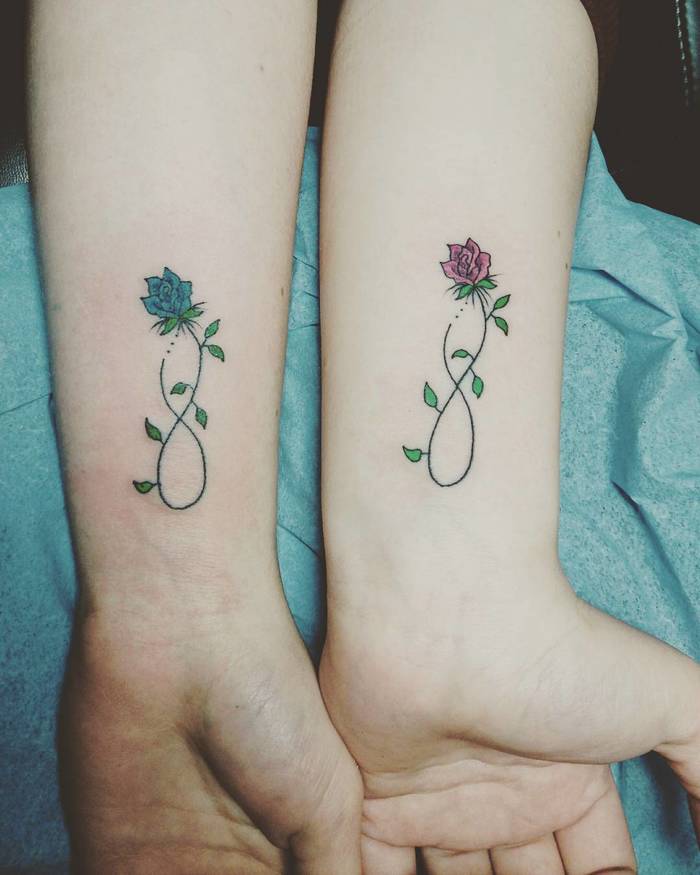 Matching Floral Tattoos by paul egan