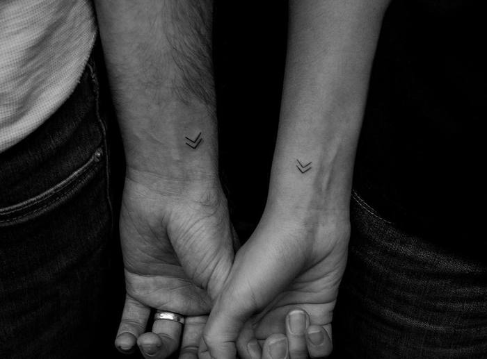 Minimalist Matching Tattoos on Couple by Kevin King