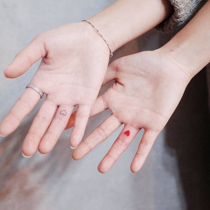 Matching Minimalist Hearts on Fingers by wittybutton_tattoo