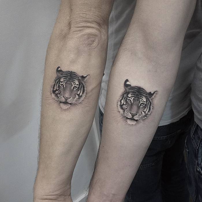 Matching Tiger Tattoos by Elisabeth Markov