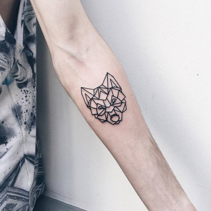 Geometric Wolf Head Tattoo by Severov Roma Tattooer