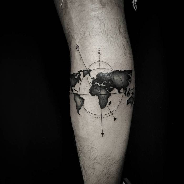World map tattoo with geometric elements by Guy Levi