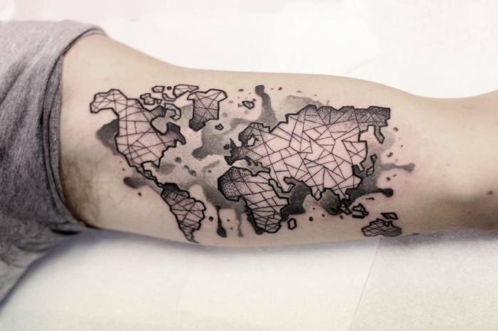 Black Geometric World Map Tattoo by Martynas Šnioka