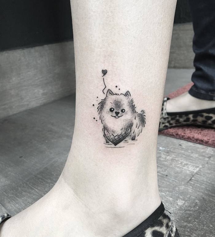 Pomeranian Dog Tattoo by pinkbecker