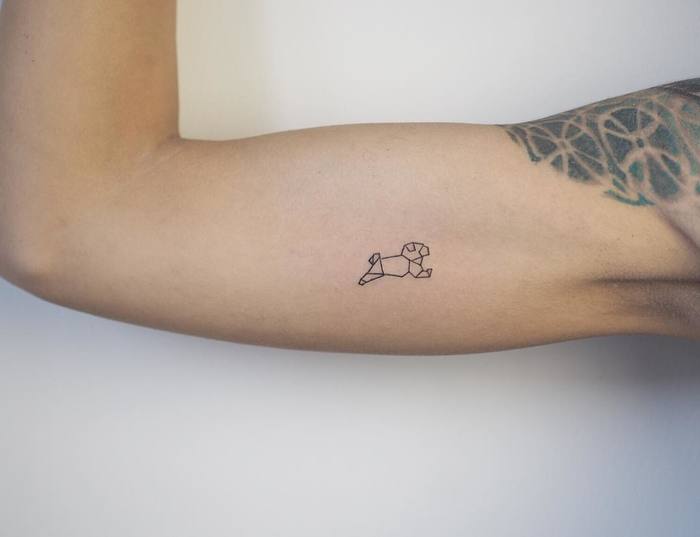 Tiny Geometric Pug Tattoo by Cagri Durmaz