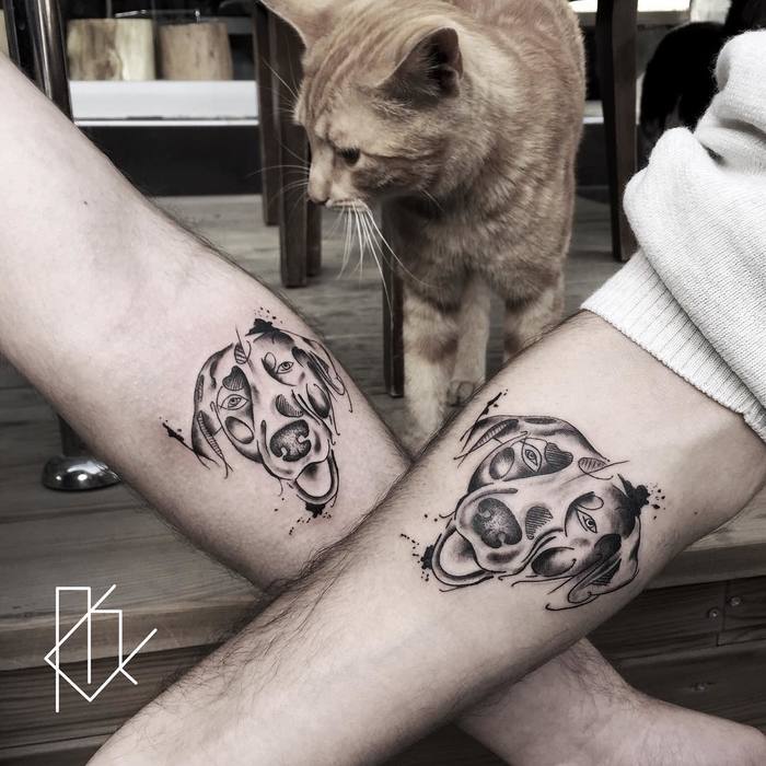 Matching Dog Tattoos by Mehmet Çelik