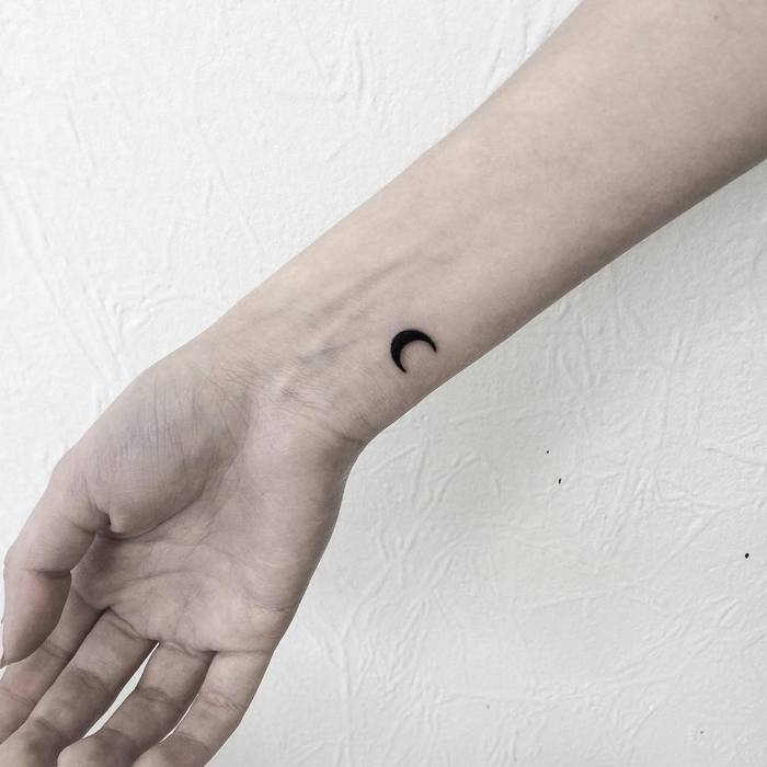 Tiny Crescent Moon Tattoo by victoriascarlet93