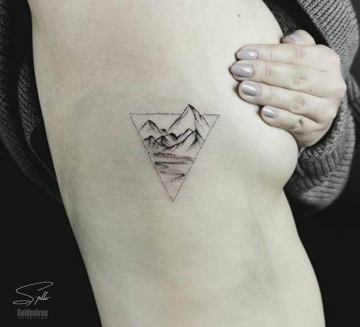 Mountain Tattoo on Ribcage by stellatxttoo