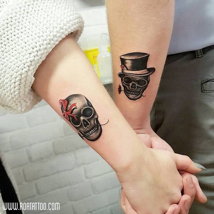 Matching Skull Tattoos by Roa Tattoo 