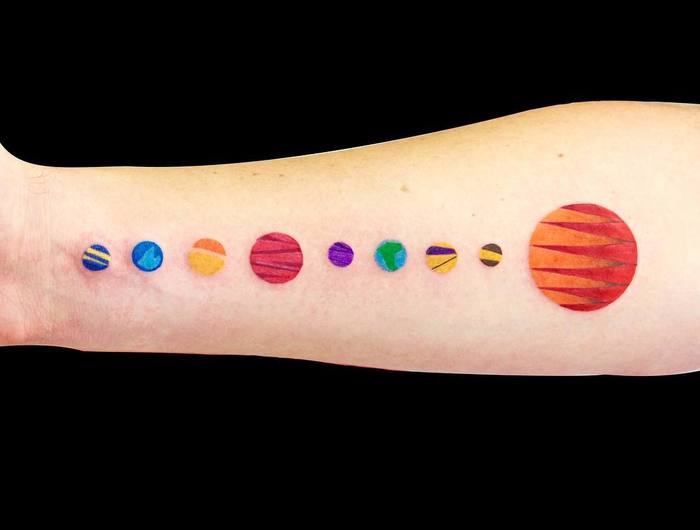 Colored Solar System Tattoo by Ge Zhang