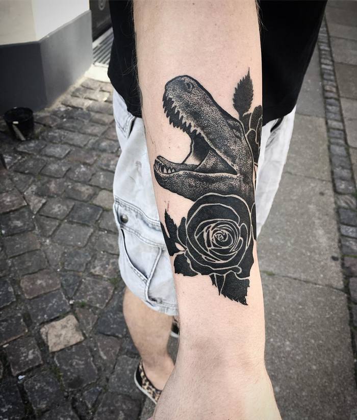 Black Ink Dinosaur Tattoo and Rose by ninasmithtattoo