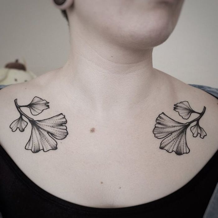 Symmetrical Ginkgo Leaves on Collarbones by clarisseamourtattoo