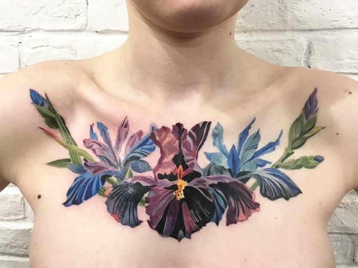 Multicolored Iris Flowers on Chest by rit.kit.tattoo