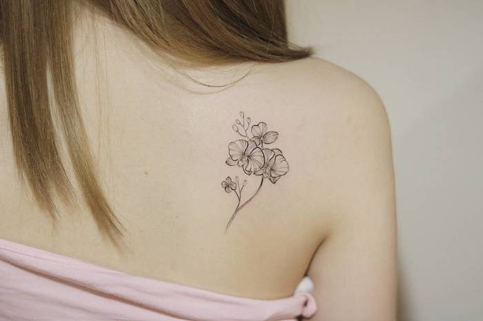 Subtle Orchid Tattoo by tattooist_ty