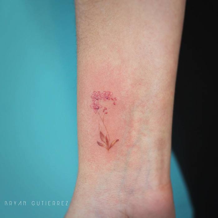 Little Orchid Tattoo on Wrist by bryan.gee
