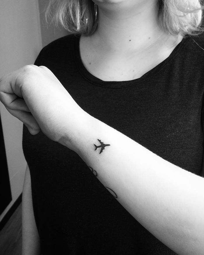 Small Airplane Tattoo by tuulirongastattoo