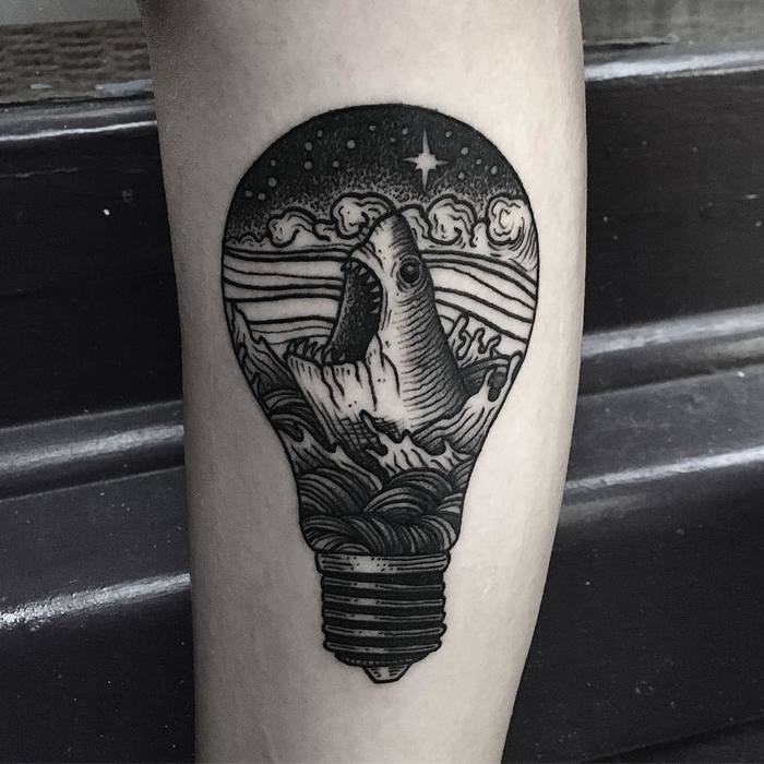Blackwork Light Bulb Tattoo by merry_tattooer