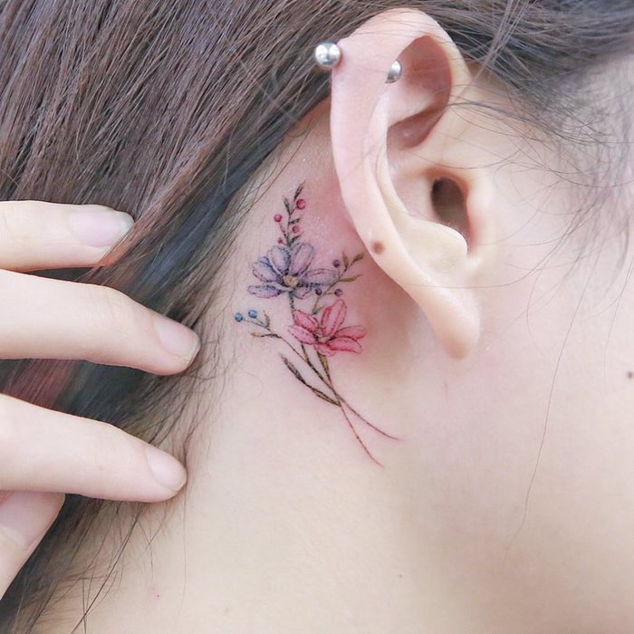 Small Floral Tattoo Behind the Ear