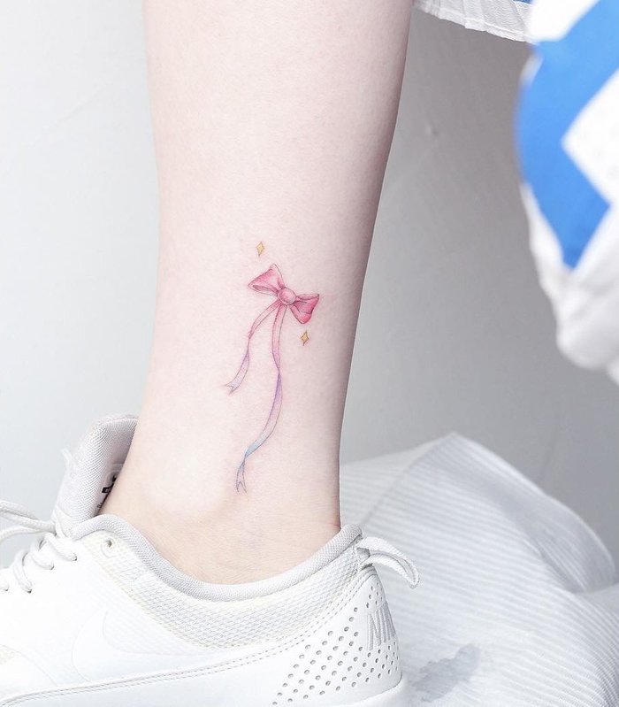 Pretty Ribbon Tattoo on Leg