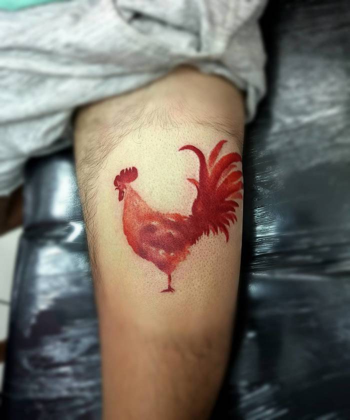 Red Ink Rooster Tattoo by paul_doxas_destinytattoo