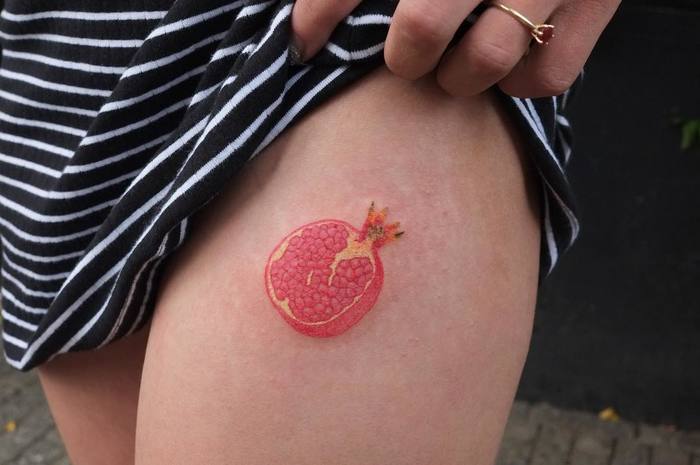 Sweet Pomegranate Tattoo on Thigh by yar.put