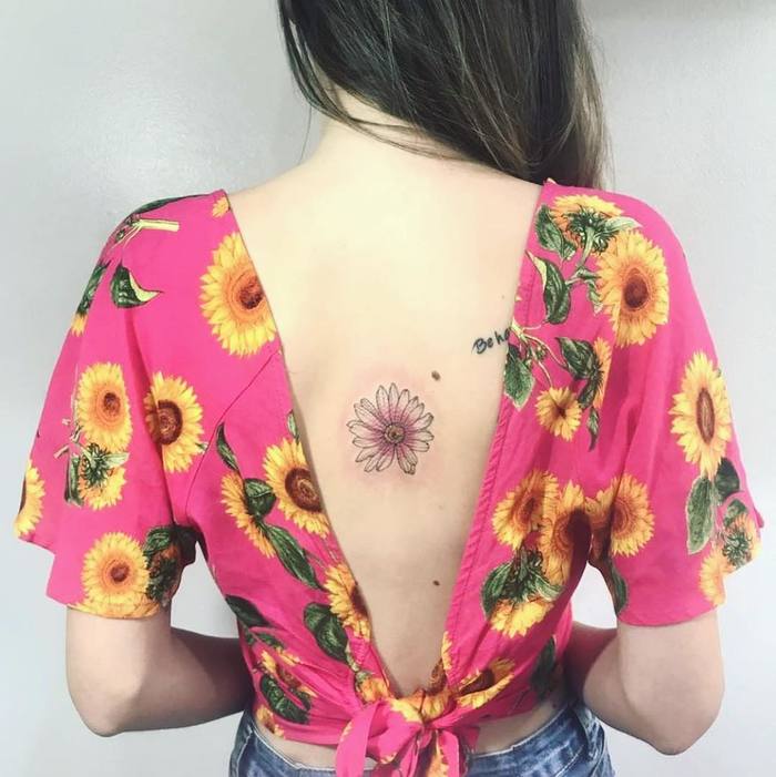Beautiful Daisy Flower Tattoo on Back by samanthatattoo