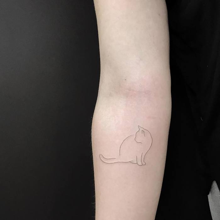 Minimalist Cat Silhouette by jakubnowicztattoo