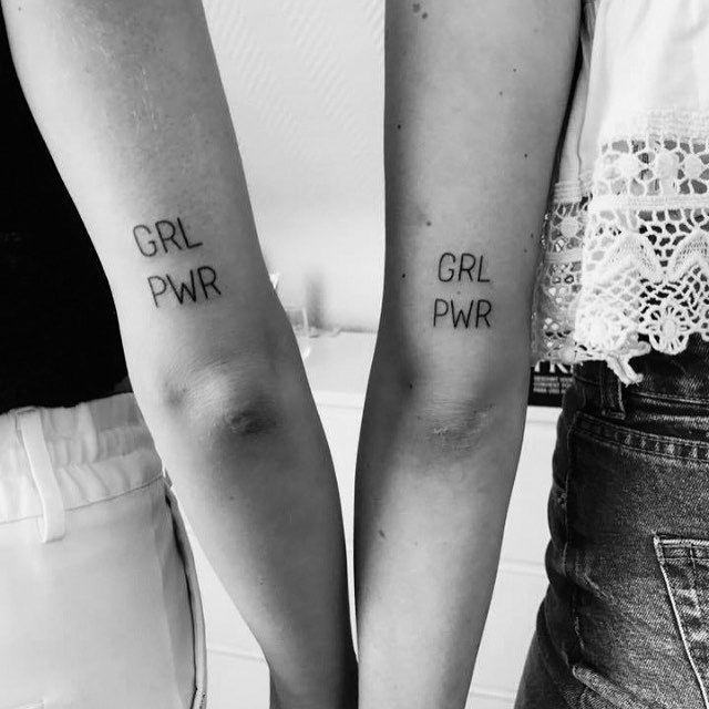 Matching 'GRL PWR' Tattoos by lunamothtattoo