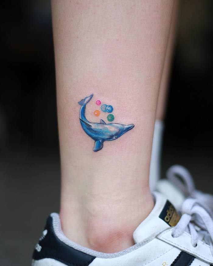 Blue Ink Dolphin Tattoo on Ankle by woori_tattoo