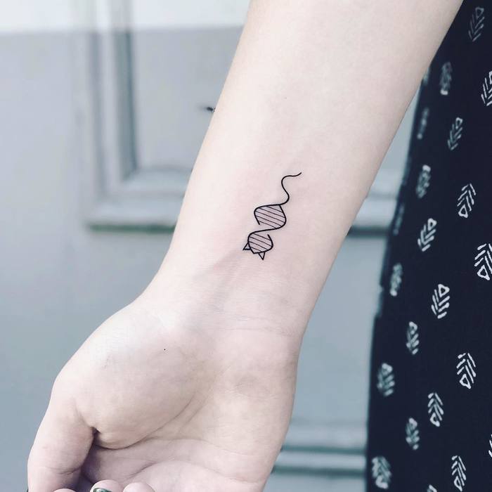 Tiny DNA Cat Tattoo on Wrist by nothingwildtattoo