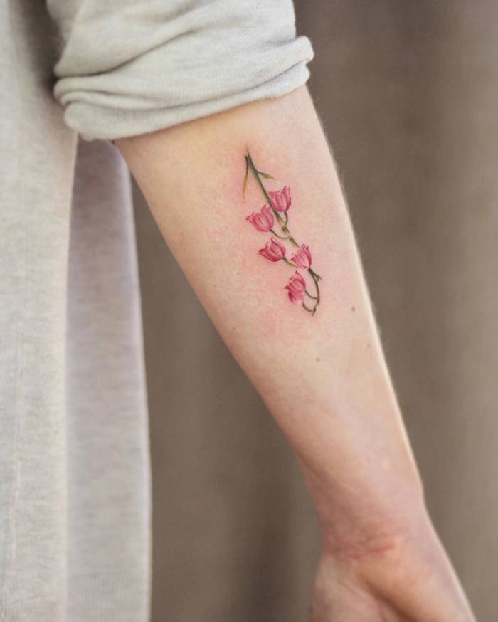 Pink Lily of the Valley Tattoo by Cindy van Schie