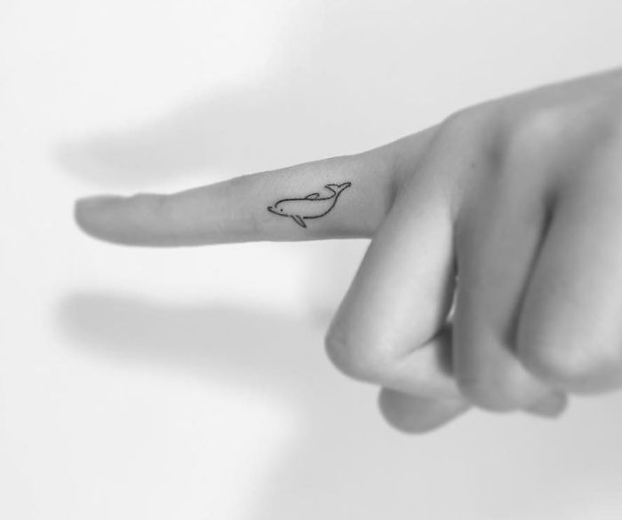 Minimalist Dolphin Tattoo By Playground Tattoo