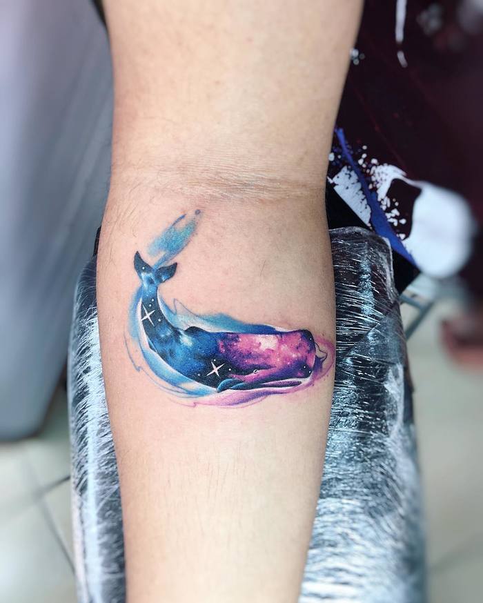 Watercolor Space Whale Tattoo on Inner Forearm by Adrian Bascur