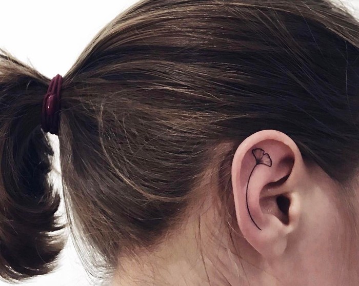 Tiny Ginkgo Leaf Tattoo on Ear by nesheva_ulyana