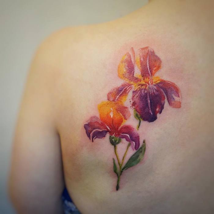 Multicolored Irises on Shoulder Blade by gnotattoo